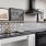 a kitchen with white cabinets