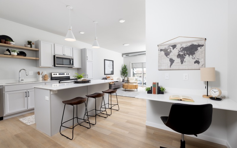 view of apartment desk and kitchen