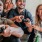 people holding game controllers