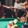 a man playing pool